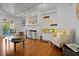 Bright living room with hardwood floors, fireplace, and comfortable seating, ideal for relaxation at 813 Hudson Ave, Sarasota, FL 34236
