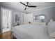 Spacious main bedroom featuring ensuite bathroom, hardwood floors, and elegant decor at 813 Hudson Ave, Sarasota, FL 34236