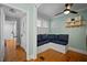Cozy mudroom featuring a built-in bench with seating, ample natural light, and charming decor at 813 Hudson Ave, Sarasota, FL 34236