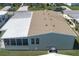 An aerial view featuring the home with screened-in porch, offering privacy and relaxation at 8424 Regal Way, Palmetto, FL 34221