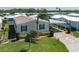 An aerial shot of a charming home surrounded by well-maintained lawns and landscaping at 8424 Regal Way, Palmetto, FL 34221