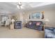 Open-concept living room flowing into the dining area, perfect for entertaining and gatherings at 8424 Regal Way, Palmetto, FL 34221