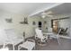 Patio with table, four chairs, and nautical decor at 8424 Regal Way, Palmetto, FL 34221