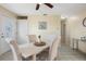 Charming dining area showcasing elegant decor, modern furnishings, and ample natural light at 8798 Herbison Ave, North Port, FL 34287