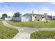 Cozy single-story home with a fenced yard and sidewalk at 8798 Herbison Ave, North Port, FL 34287