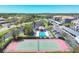 Community pool and tennis courts at 9620 Club South Cir # 5306, Sarasota, FL 34238