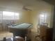 Spacious game room with a pool table and plenty of room at 965 Whitman Dr, Sarasota, FL 34243