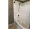 Clean bathroom with shower and tub, plus ample storage space at 5691 Bentgrass Dr # 15-102, Sarasota, FL 34235