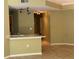 Kitchen area showcasing track lighting and a breakfast bar area, with a tiled floor at 5691 Bentgrass Dr # 15-102, Sarasota, FL 34235