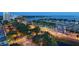 Beautiful aerial view showcasing the city and bay with lush landscaping and a bustling marina at 101 S Gulfstream Ave. # 9C, Sarasota, FL 34236