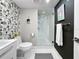 Tastefully designed bathroom with modern fixtures, frameless shower, and chic decor at 101 S Gulfstream Ave. # 9C, Sarasota, FL 34236