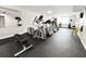 Well-equipped gym with treadmills, elliptical, weight bench, and fitness equipment for residents to enjoy at 101 S Gulfstream Ave. # 9C, Sarasota, FL 34236