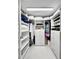 Spacious walk-in closet with custom shelving and drawers for optimal storage at 101 S Gulfstream Ave. # 9C, Sarasota, FL 34236