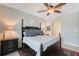 Stylish main bedroom features a four-poster bed, classic furnishings, and three bright windows at 1110 93Rd Nw St, Bradenton, FL 34209