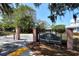 The Robinson Preserve entrance featuring brick pillars, iron gate, mature trees, and landscaped grounds at 1110 93Rd Nw St, Bradenton, FL 34209
