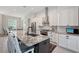 Gourmet kitchen boasts granite counters, stainless steel appliances, and a breakfast bar with seating at 1110 93Rd Nw St, Bradenton, FL 34209