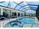 This in-ground pool and spa features plenty of seating with an enclosed patio for enjoying the outdoors at 1110 93Rd Nw St, Bradenton, FL 34209