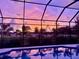 Enjoy beautiful colorful sunsets from this screened-in pool at 1110 93Rd Nw St, Bradenton, FL 34209