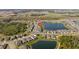 Strategic aerial view of a home with a lake view in a Gathering-friendly neighborhood at 11221 Gallatin Trl, Parrish, FL 34219
