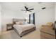 Comfortable bedroom with neutral tones, soft carpet, and a large window that offers plenty of natural light at 11221 Gallatin Trl, Parrish, FL 34219
