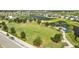 Spacious community park with a playground, green space, and scenic water views at 11221 Gallatin Trl, Parrish, FL 34219