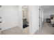 Hallway view to bathroom and bedroom at 11221 Gallatin Trl, Parrish, FL 34219