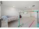 Spacious loft is furnished with bed and features a gymnastic bar at 11221 Gallatin Trl, Parrish, FL 34219