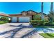 Beautiful single-Gathering home with a tile roof, a brick driveway, mature landscaping, and a three-car garage at 116 Pescador Pl, Nokomis, FL 34275
