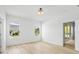 Bright bedroom with wood flooring and a view of the backyard at 11790 Fennemore Way, Parrish, FL 34219