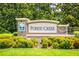 The Forest Creek community sign with landscaping and brick accents at 11790 Fennemore Way, Parrish, FL 34219