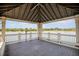 Pavilion overlooking a tranquil lake, creating a picturesque and relaxing outdoor gathering space at 11790 Fennemore Way, Parrish, FL 34219
