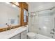 Bathroom featuring a shower with glass door and modern vanity at 1248 Jefferson Dr, Englewood, FL 34224