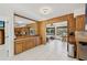 Open-concept living area seamlessly connects the kitchen, dining, and sitting areas at 1248 Jefferson Dr, Englewood, FL 34224