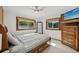 Relaxing main bedroom with natural light and modern furnishings at 1248 Jefferson Dr, Englewood, FL 34224