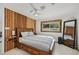 Inviting main bedroom with a large window and a ceiling fan at 1248 Jefferson Dr, Englewood, FL 34224
