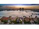 Waterfront homes with boat docks and stunning views of the harbor and city skyline at sunset at 125 12Th E Ave, Palmetto, FL 34221