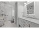 Luxurious bathroom features marble countertops, marble walls, and stylish modern fixtures at 125 12Th E Ave, Palmetto, FL 34221