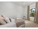 Comfortable bedroom featuring soft lighting and a neutral color palette at 125 12Th E Ave, Palmetto, FL 34221