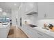 Elegant kitchen featuring modern appliances and waterfront views at 125 12Th E Ave, Palmetto, FL 34221