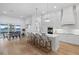 Bright, spacious kitchen featuring an island with seating and modern appliances at 125 12Th E Ave, Palmetto, FL 34221