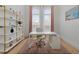 Bright home office featuring a desk, shelving, and natural light at 125 12Th E Ave, Palmetto, FL 34221