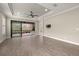Open concept living area with tile flooring, recessed lights, and a ceiling fan at 12659 Sorrento Way, Bradenton, FL 34211