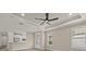 Bright, open living space featuring tile floors and recessed lighting adjacent to the kitchen at 12659 Sorrento Way, Bradenton, FL 34211