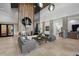 Modern lobby with stylish seating, wood accent wall, and contemporary lighting at 12659 Sorrento Way, Bradenton, FL 34211