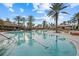 Gorgeous pool with lounge chairs and umbrellas, perfect for soaking up the sun in a luxurious setting at 12659 Sorrento Way, Bradenton, FL 34211