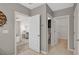 Hallway leading to bedroom and bathroom at 15408 Trinity Fall Way, Bradenton, FL 34212