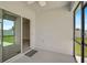 Covered patio with sliding glass door to interior at 15408 Trinity Fall Way, Bradenton, FL 34212