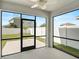 Screened patio that offers outdoor lounging and views of the fenced backyard at 15408 Trinity Fall Way, Bradenton, FL 34212
