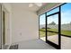 Enclosed patio with views of fenced backyard at 15408 Trinity Fall Way, Bradenton, FL 34212