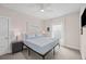 Bedroom features a queen bed, and a large window at 1623 8Th W Ave, Bradenton, FL 34205